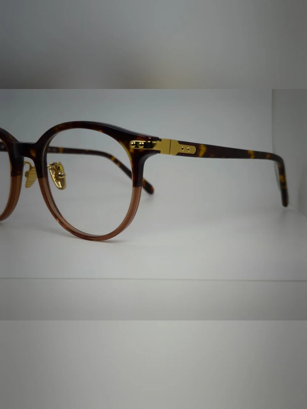 Dotti. Smoke Under Tortoiseshell Upper.  Eyeglasses - Brown Amber. Gold